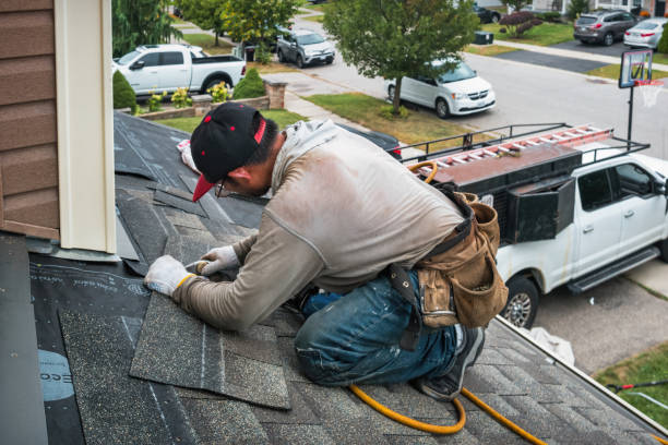 Professional Roofing technician working in Russell, PA